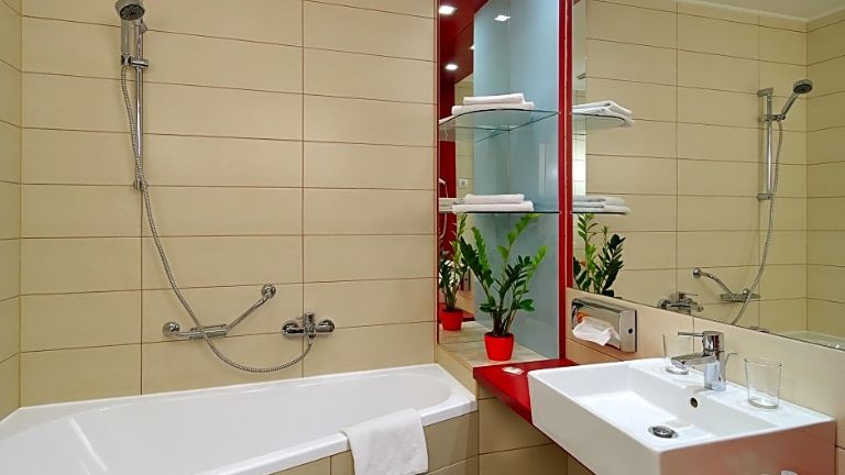 Promenade City Hotel salle de bain baignoire