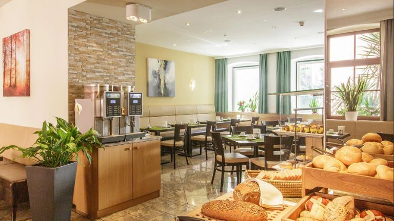 Htel Lucia - Salle de petit-djeuner